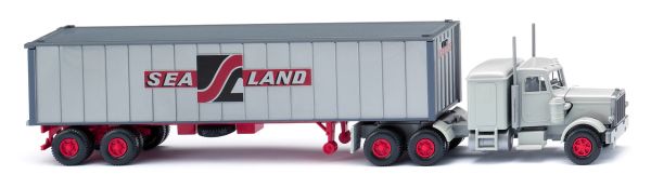 WIK052707 - PETERBILT 6x4 met containerdrager en SEALAND container - 1