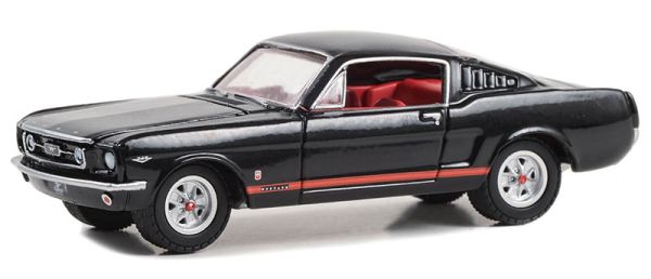 GREEN13340-A - Zwarte 1965 FORD Mustang GT uit THE STAMPEDE serie in blisterverpakking - 1