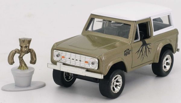 JAD34415 - FORD Bronco 1973 bruin met GROOT figuur - 1