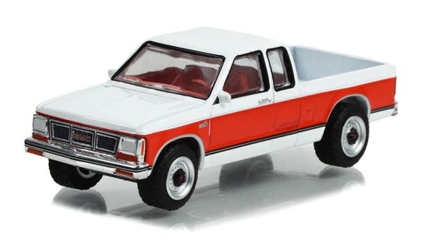 GREEN35250-B - 1984 GMC S-15 Sierra Classic uit de ALL TERRAIN serie onder blister. - 1