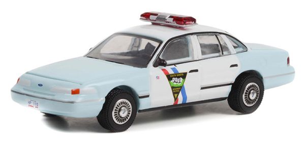 GREEN43000-B - 1992 FORD Crown Victoria Police Interceptor South Dakota uit de HOT PURSUIT serie in blisterverpakking - 1