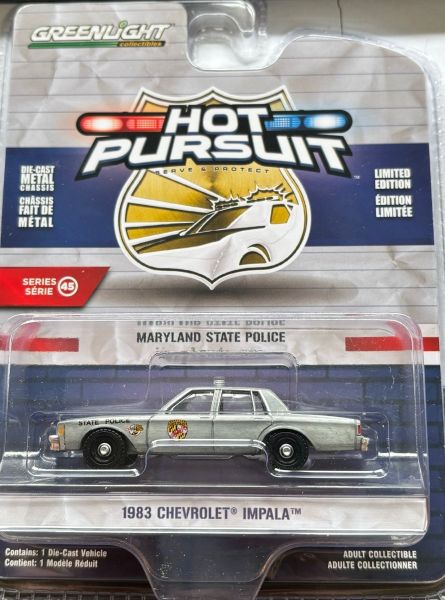 GREEN43030-A-GRIS - 1983 CHEVROLET Impala grijs Maryland Police uit de HOT PURSUIT serie in blisterverpakking - 1