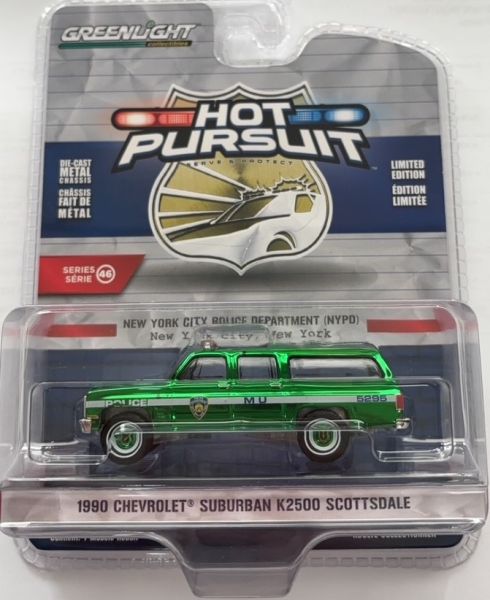 GREEN43040-D-VERT - 1990 CHEVROLET Suburban K2500 Scottsdale Green uit de HOT PURSUIT serie in blisterverpakking - 1