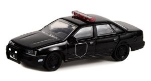 GREEN28110-F - FORD Taurus 1988 Black Bandit Police uit de serie BLACK BANDIT onder blister