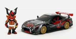 JAD35668 - 1993 MAZDA RX-7 zwart met Saru apen figuur