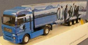 CON66101 - MAN TGA XXL 4x2 met 3 assen aanhanger 2011 WEIHNACHTSMODELL