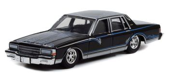 GREEN63010-D - CHEVROLET Caprice zwart 1987 uit de serie CALIFORNIA LOWRIDERS onder blister