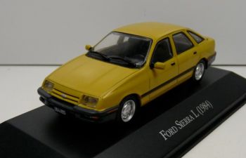 MAGARGAQV28 - FORD Sierra I 1984 Geel met boekje